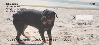 Rottweilers At The Beach